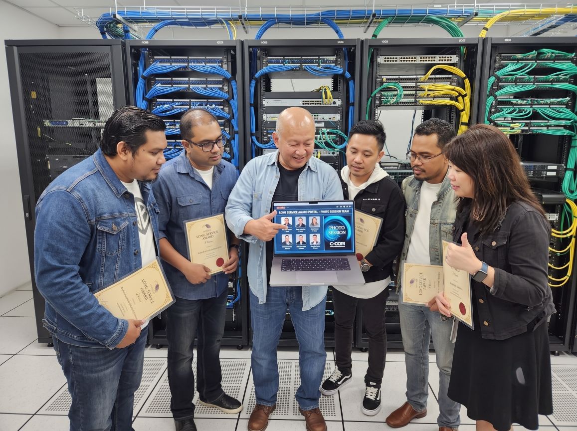 Inteksoft engineers collaborating in a modern server room